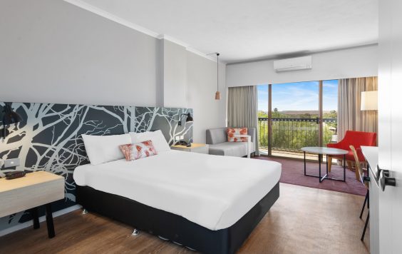Deluxe King Room with balcony looking out over Kalgoorlie