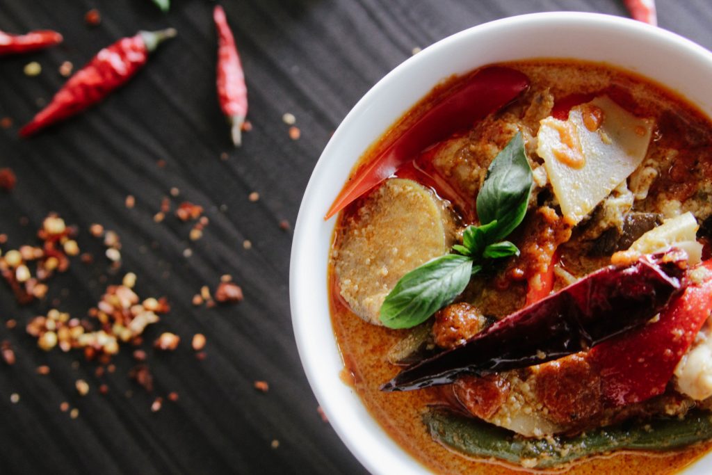 A Thai-style soup garnished with chilli and basil